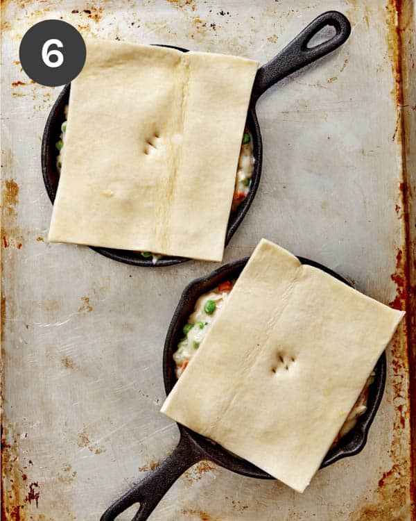 Chicken pot pie with puff pastry on top about to go into the oven.